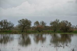 inundado campos después grande tormentas foto