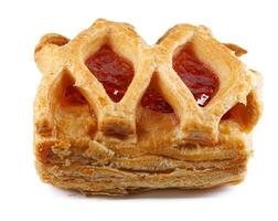 Puff pastry pastry with lingonberry jam isolated on a white background. Cookies with lingonberry jam. photo