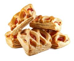 Puff pastry pastry with lingonberry jam isolated on a white background. Cookies with lingonberry jam. photo