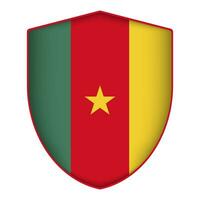 Cameroon flag in shield shape. Vector illustration.