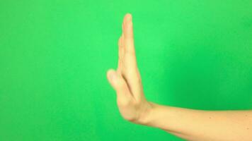 Hand on green background, green screen of hand video