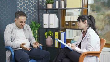 Psychiatrist doctor explaining to her crying patient. video