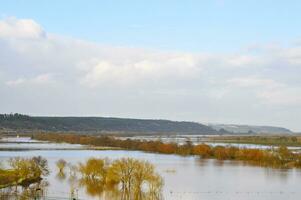 Agricultural fields and roads flooded due to heavy rain in Portugal photo