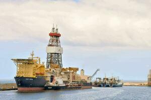 a large oil rig in the ocean photo