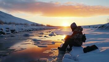 un hombre se sienta en el banco de un congelado río y mira a el puesta de sol. ai generado. foto