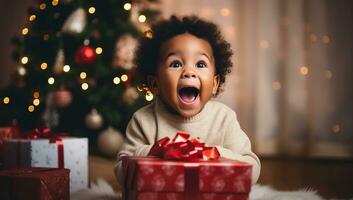 Portrait of a cute african-american baby boy sitting on the floor near the Christmas tree and holding a gift box. AI Generated. photo