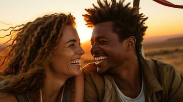 Cheerful multiethnic couple laughing and looking at each other in the sunset. AI Generated. photo