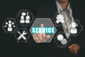 Service concept, Business woman hand touching service icon on virtual screen. photo