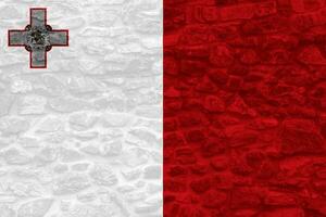Flag of Republic of Malta on a textured background. Concept collage. photo