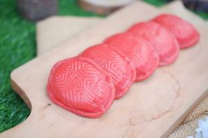 Kue ku, kue tok, or red turtle cake, traditional cake in an indonesia photo