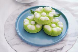 Kue Putu Ayu, a traditional Indonesian snack made from rice flour, pandan leaves, grated coconut then steamed. photo