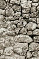 Ancient stone wall texture photo