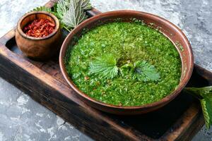 Homemade soup made of nettles photo