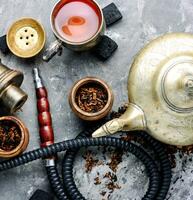 Modern hookah with tea photo