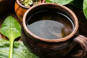 Herbal plantain tea photo