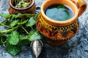 Healing tea with nettle photo