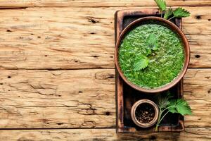 Stringing nettle soup photo