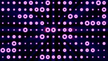 Abstract background of bright purple glowing light bulbs from circles and dots of energy magic disco wall video