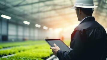 A farmer using a tablet to monitor crop growth and soil health Farming and agriculture concept AI Generated photo