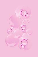 un rosado antecedentes con muchos burbujas en eso foto