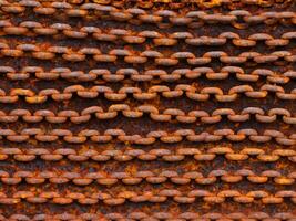 rusty metal texture with chain as a background photo