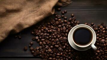 Close-up of a cup of black coffee surrounded by roasted coffee beans on a dark wooden table with a rustic burlap cloth backdrop. Generative AI photo