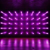 Wall adorned with bright purple LED lamps, creating an incandescent atmosphere For Social Media Post Size AI Generated photo