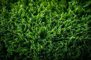 Artificial green grass texture, a vibrant backdrop for creative projects AI Generated photo