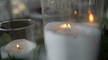 Burning candle in glass. Candle flame. video