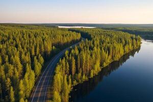 Aerial view of highway and forest in Finland. Drone photography. photo
