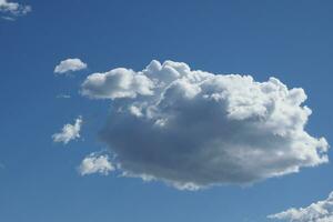 lonely cloud over sky background photo