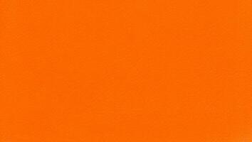 industrial style orange leatherette plastic texture background photo