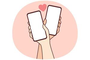 Couple hands with cellphones and internet dating photo