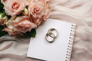 Top view wedding rings and paper with flowers, ai generative photo