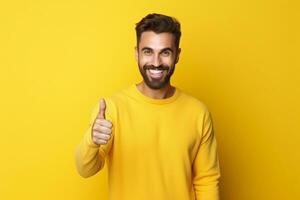 young man happily keeping thumbs up on isolated yellow background copy space ai generative photo