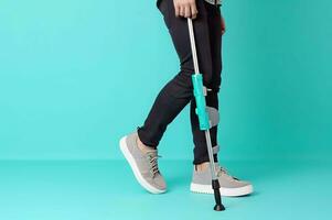 Man injured leg using crutches. Generate Ai photo