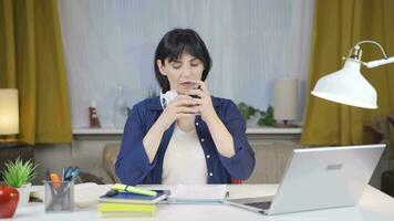 A Female student spraying perfume. video