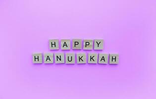 December 18-26, Hanukkah, minimalistic banner with the inscription in wooden letters photo