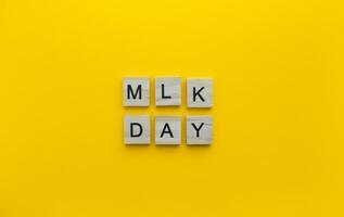 January 16, MLK Day, Martin Luther King Day, minimalistic banner with the inscription in wooden letters photo