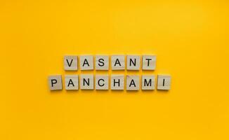 January 26, Vasant Panchami, a minimalistic banner with an inscription in wooden letters photo