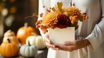 AI Generative. Female hands holding bouquet of autumn flowers and with blank card, closeup photo