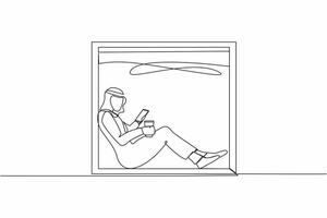 Single one line drawing young Arab man sitting on windowsill with smartphone and coffee, enjoying rest at home. Comfortable relax time with hot drink. Continuous line draw design vector illustration