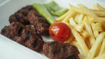 Traditional Turkish Cuisine Meatball Akhisar Kofte in a take away packet video