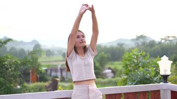 Female tourists stretch their bodies to take in the bright atmosphere. video