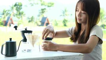 Woman sniffing coffee beans It has a delicious smell. video