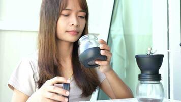 Woman sniffing coffee beans It has a delicious smell. video