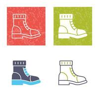 icono de vector de botas