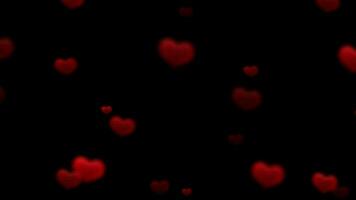 Glowing blurry red love heart shape particle flying up animation on black background, love romantic valentine day background video