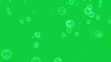 burbujas partícula que cae animación cubrir efecto en verde pantalla antecedentes video