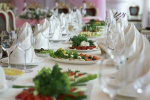 Beautifully decorated table on holiday photo